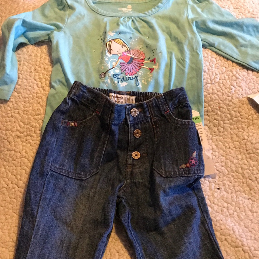 Baby blue top with jeans.